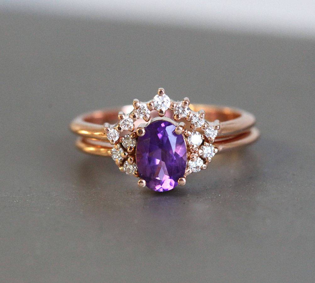 Simple amethyst ring set with diamonds