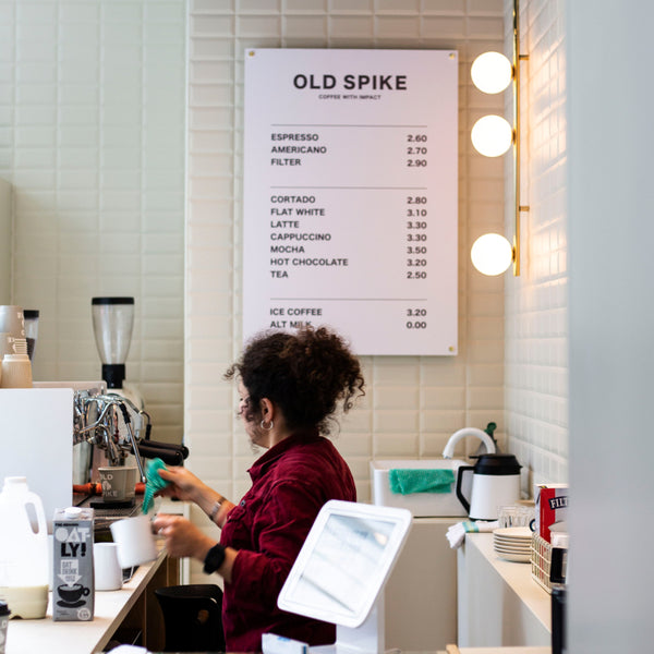 Old Spike barista working in cafe