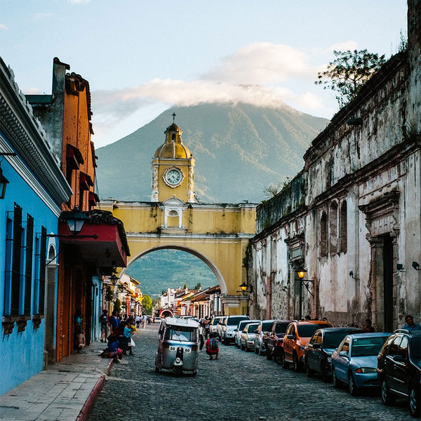 Guatemala city with tuk tuk and buldings