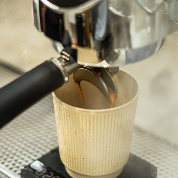 Coffee machine making a specialty coffee espresso