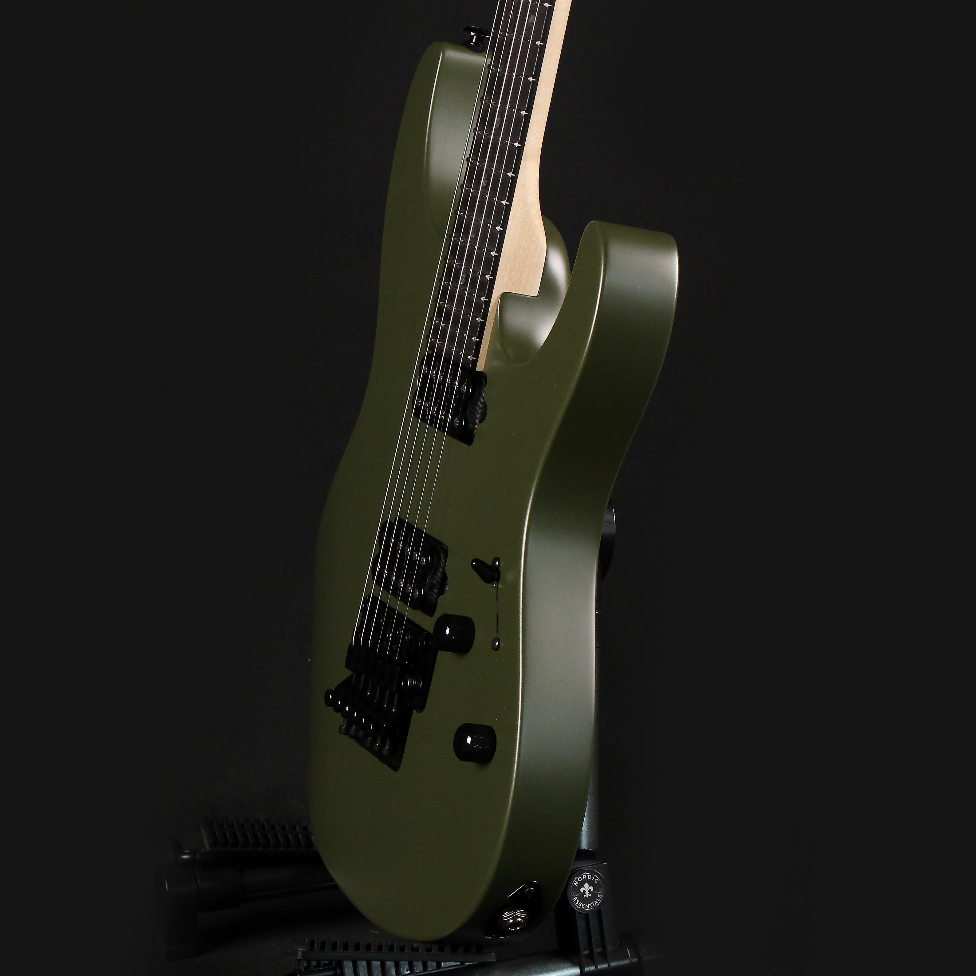 dark green electric guitar