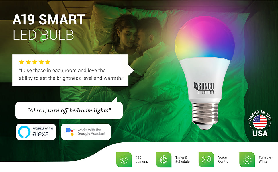 Our A19 LED Smart Bulb with an E26 base offers voice control when you pair it with your Amazon Alexa or Google Assistant. Control many settings via your smart device and an easy to use app, too. This LED offers 480 lumens of light, tunable white, a timer and schedule, and a user friendly app. Image shows a couple sleeping with a Smart LED from Sunco Lighting in their bedside table lamp. Customer review says: I use these in each room and love the ability to set the brightness level and warmth.