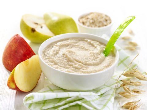 Bowl of baby food stock photo