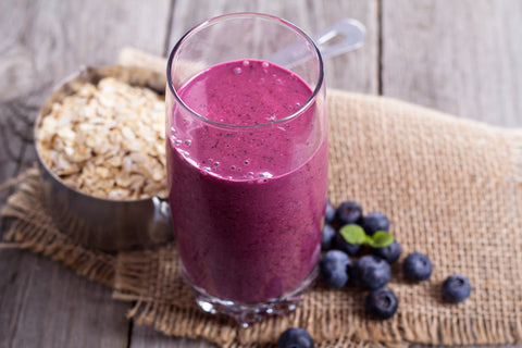 Smoothie with blueberries and oatmeal stock photo