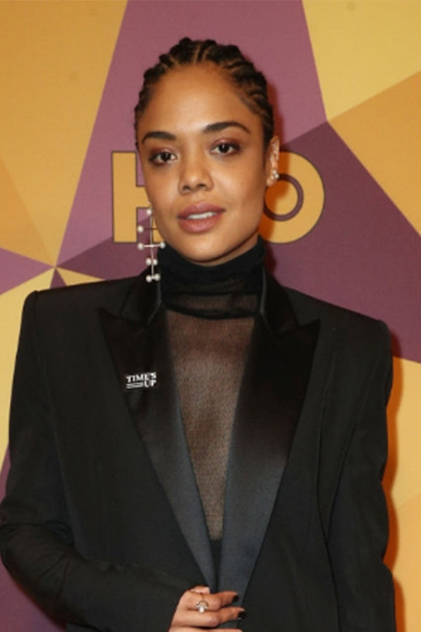 Tessa Thompson , Actress  Wears our 14K Gold Pearl Blizzard Mobile Earring .