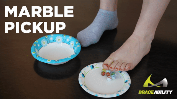 picking up marbles with toes will help stretch mallet toes without surgery