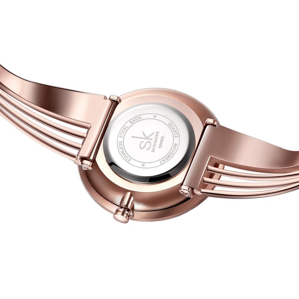 SK New Style Fashion Unique Gold-plated Women Watch Charm Ladies Wristwatch Hollow out Bracelet Quartz Personality Watch Women