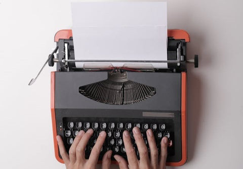 hands on a typewritter