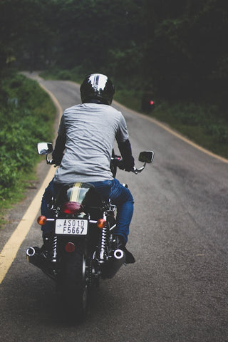 man riding motorcycle