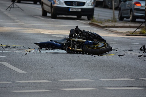 motorcycle lying on the street