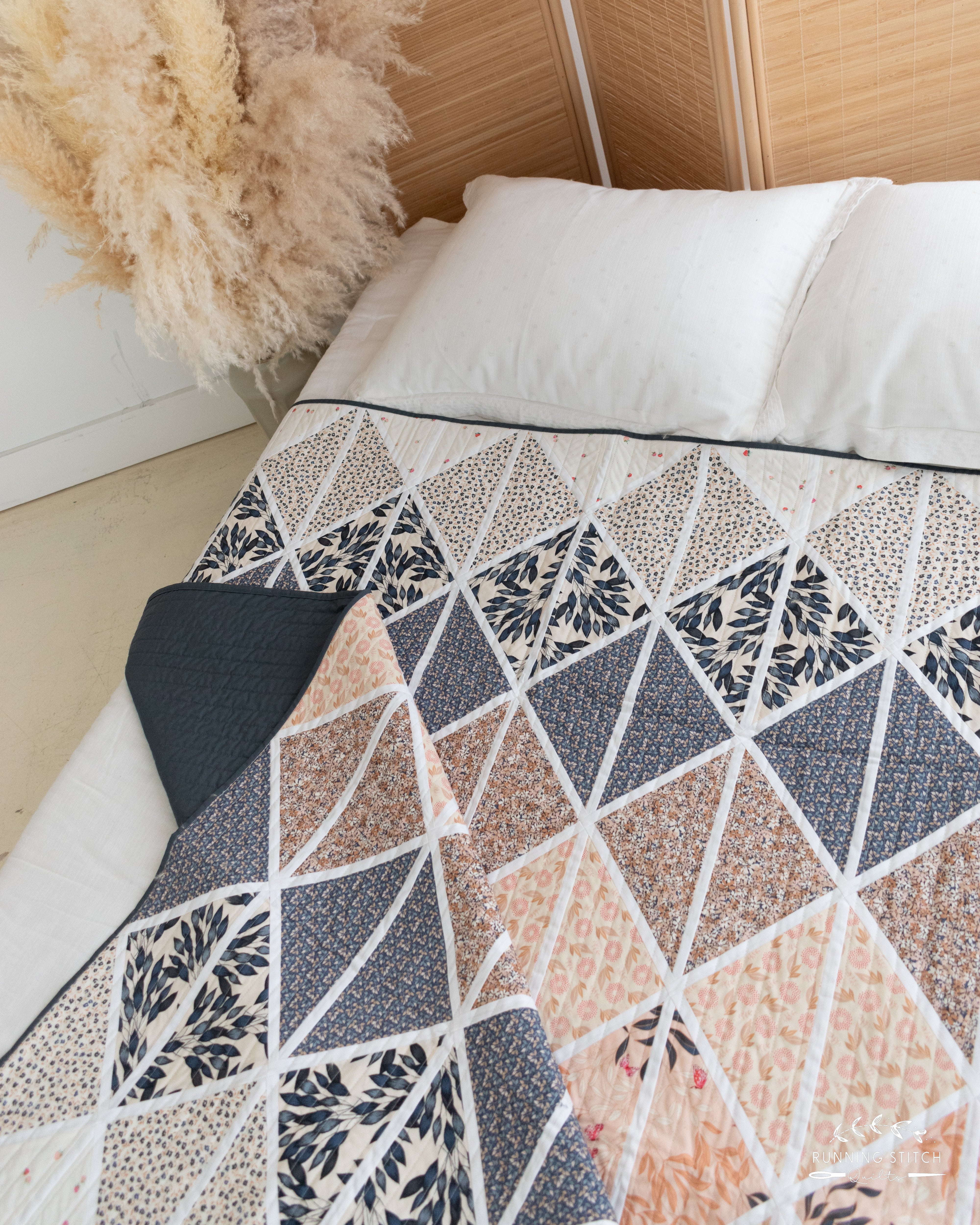 Deltille - The Haven One. A modern quilt showcasing the soft tones of an Art Gallery Fabrics quilting fabric collection.