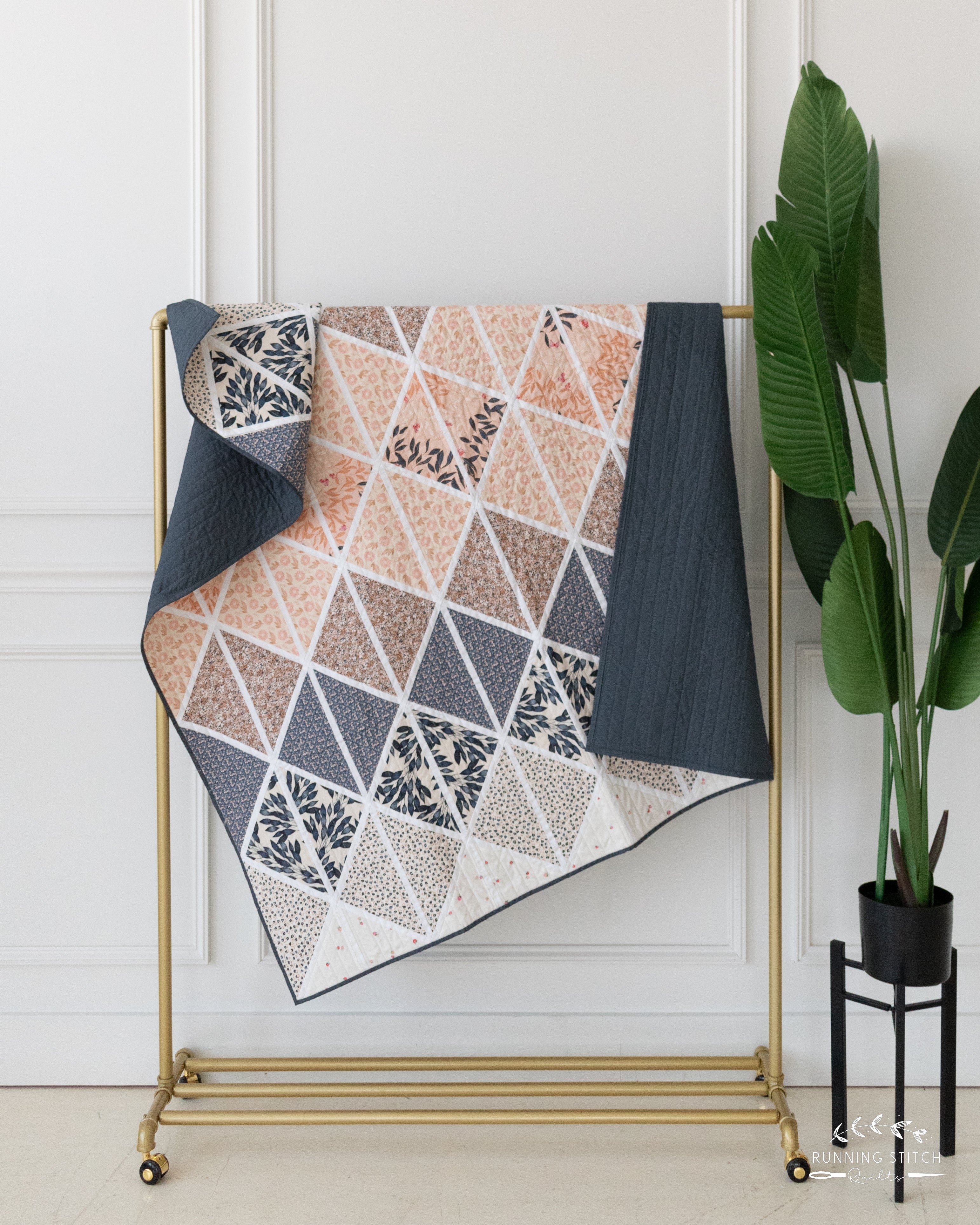 Deltille - The Haven One. A modern quilt showcasing the soft tones of an Art Gallery Fabrics quilting fabric collection.