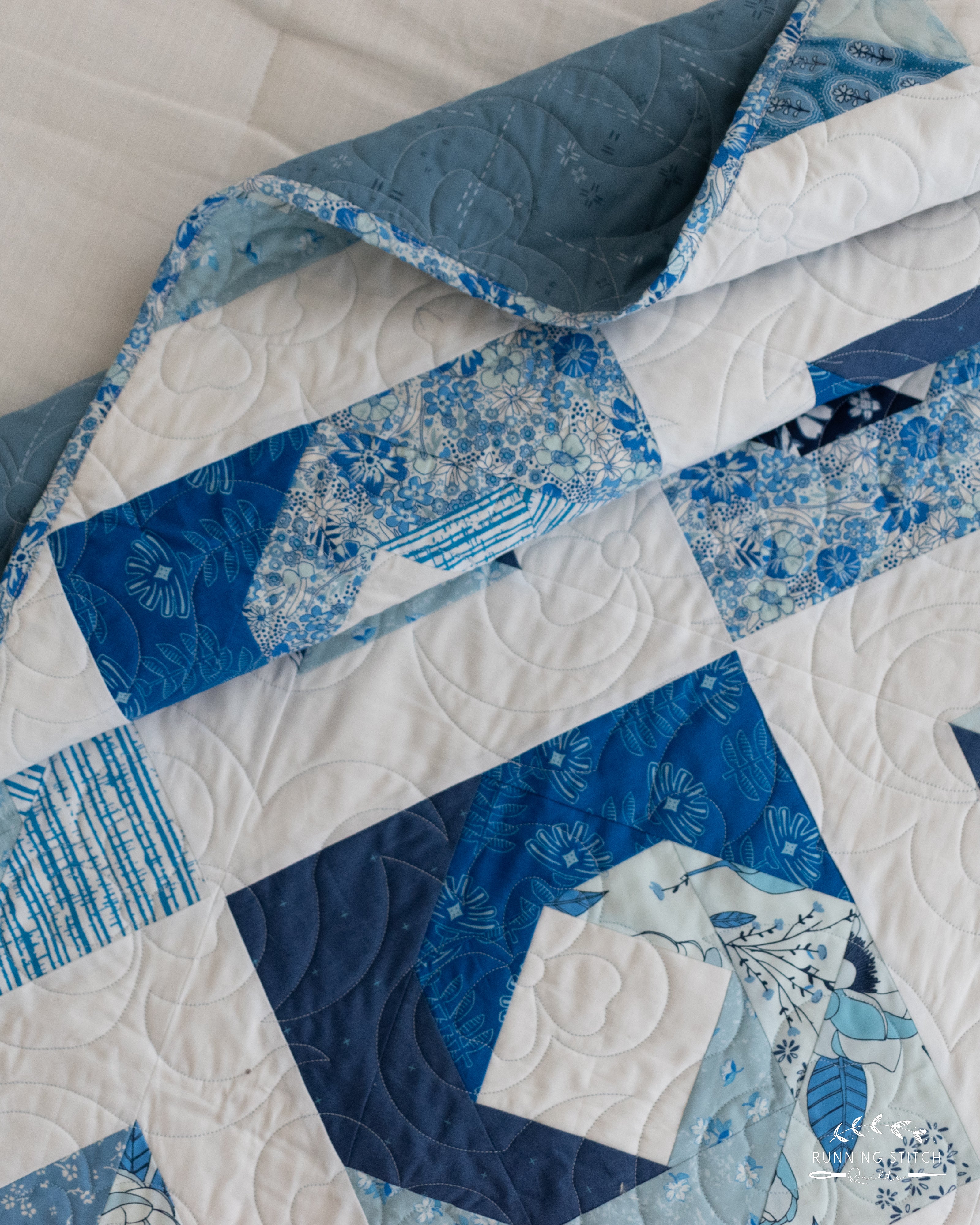 Hurrication - The True Blue One. A modern quilt showcasing the beautiful blues of an Art Gallery Fabrics quilting fabric collection.