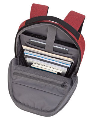 A view of a red backpack from the top, showing an open backpack filled with notebooks and a tablet