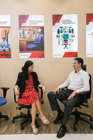 Evonne Ng (left) discussing ergonomic matters with Dc Andre (right) in Ergoland Penang branch