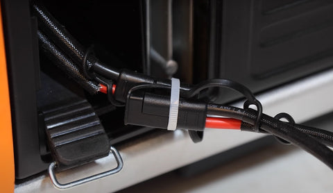 WEN generator battery quick-connectors secured with a zip tie.