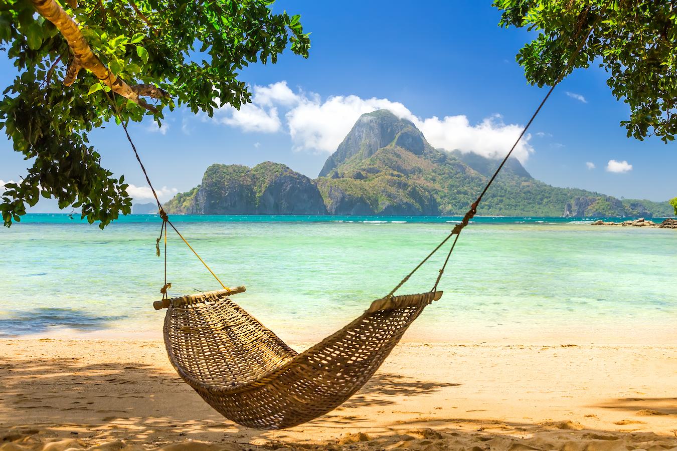 a hammock hanging out by the beach vacation visiting bali arts festival visit bali rainy season ubud food festival bali's wet season summer holidays mini high season cooler temperatures fine weather july august high season high season