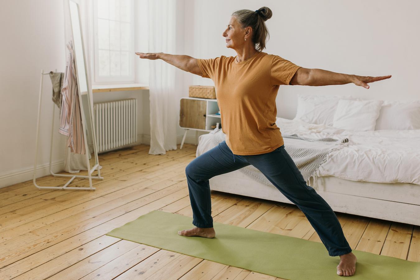 an older woman doing yoga in her bedroom spiritual practices deep sense profound sense whole life waking life personal transformation true nature dark night valuable insight greater sense