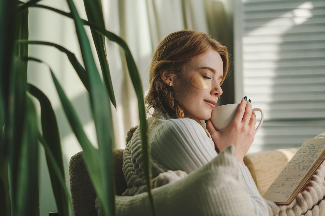 girl drinking tea wearing an under eye mask skin specialist treating dry skin conditions underlying health conditions topical steroids chlorinated water prolonged exposure