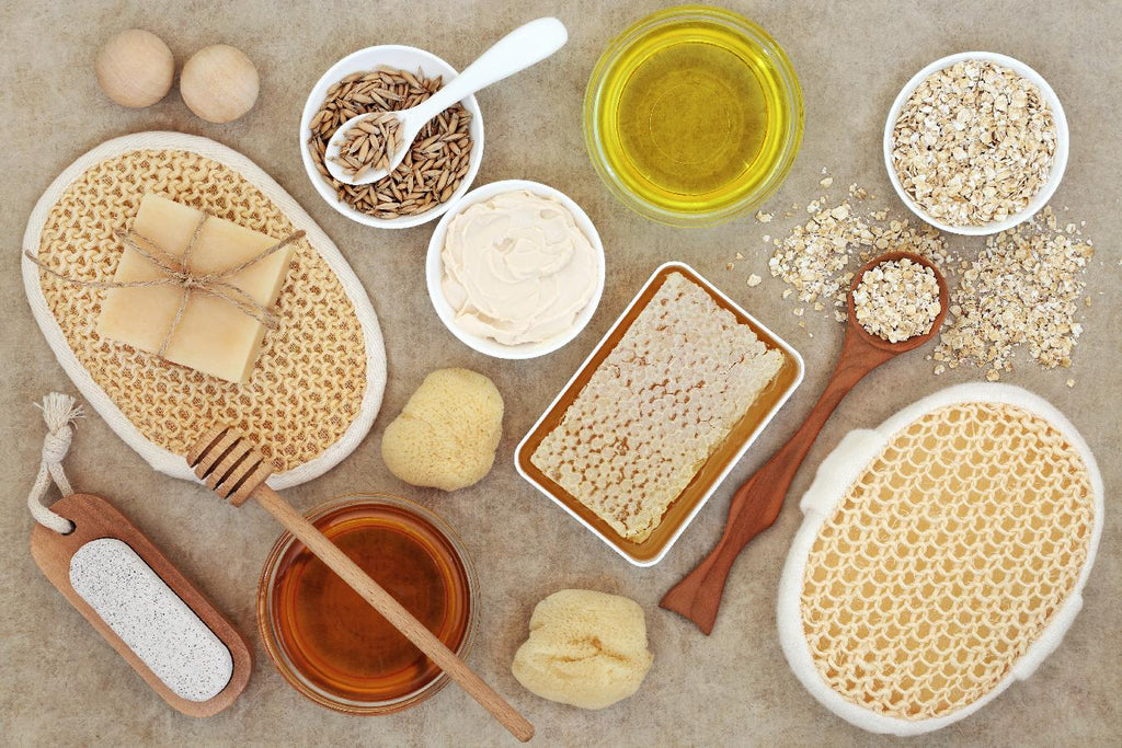 tabletop filled with various natural elements to mix together brown sugar many natural exfoliants alpha hydroxy acids essential oil sensitive skin baking soda oily skin