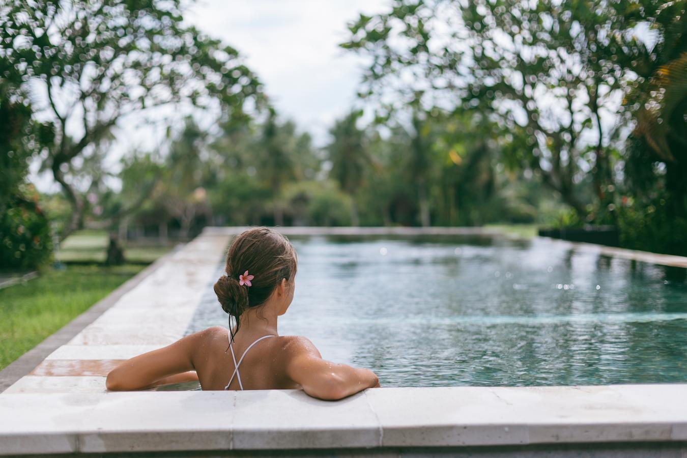 woman in a pool outside well being on site source medical conditions reduce stress entire towns sore muscles chemical peels hot water offer saunas treatment