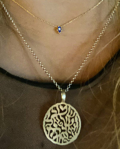 layering hamsa jewelry