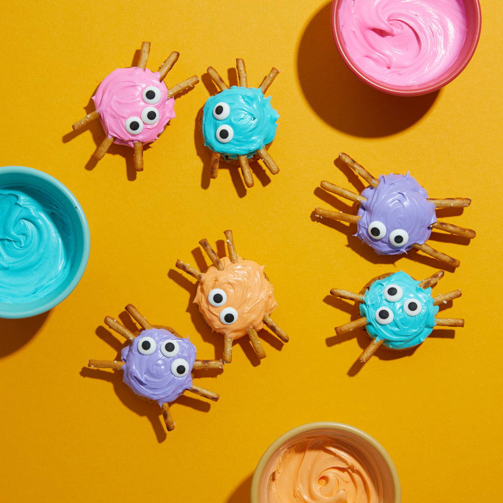 DIY Halloween spider treats and recipes with Partake allergy-friendly cookies, frosting and pretzels. 