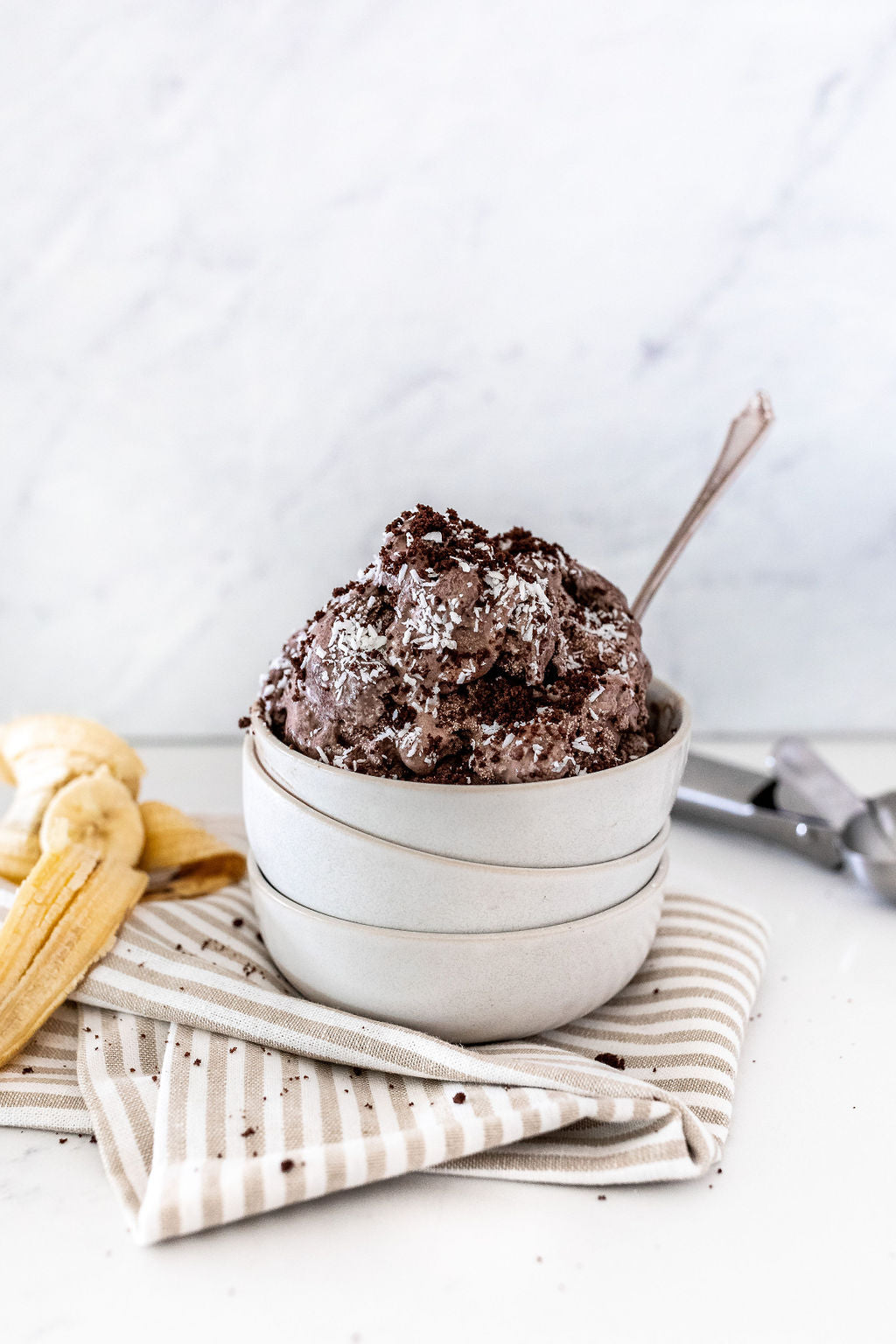 Chocolate ice cream with coconut flake sprinkles