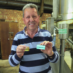 Ian holding Peppersmith mints and Peppermint Oil