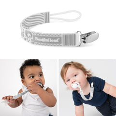 Babies using BooginHead pacifier clip silicone in grey