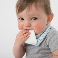 Baby chewing on BooginHead Bandana teether bib
