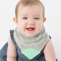 Baby wearing BooginHead Bandana Teether Bib Mint ZigZags