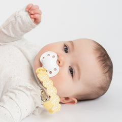 Baby using Pacifier clip lemon citrus
