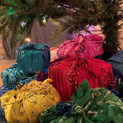 Furoshiki wrapped gifts under tree