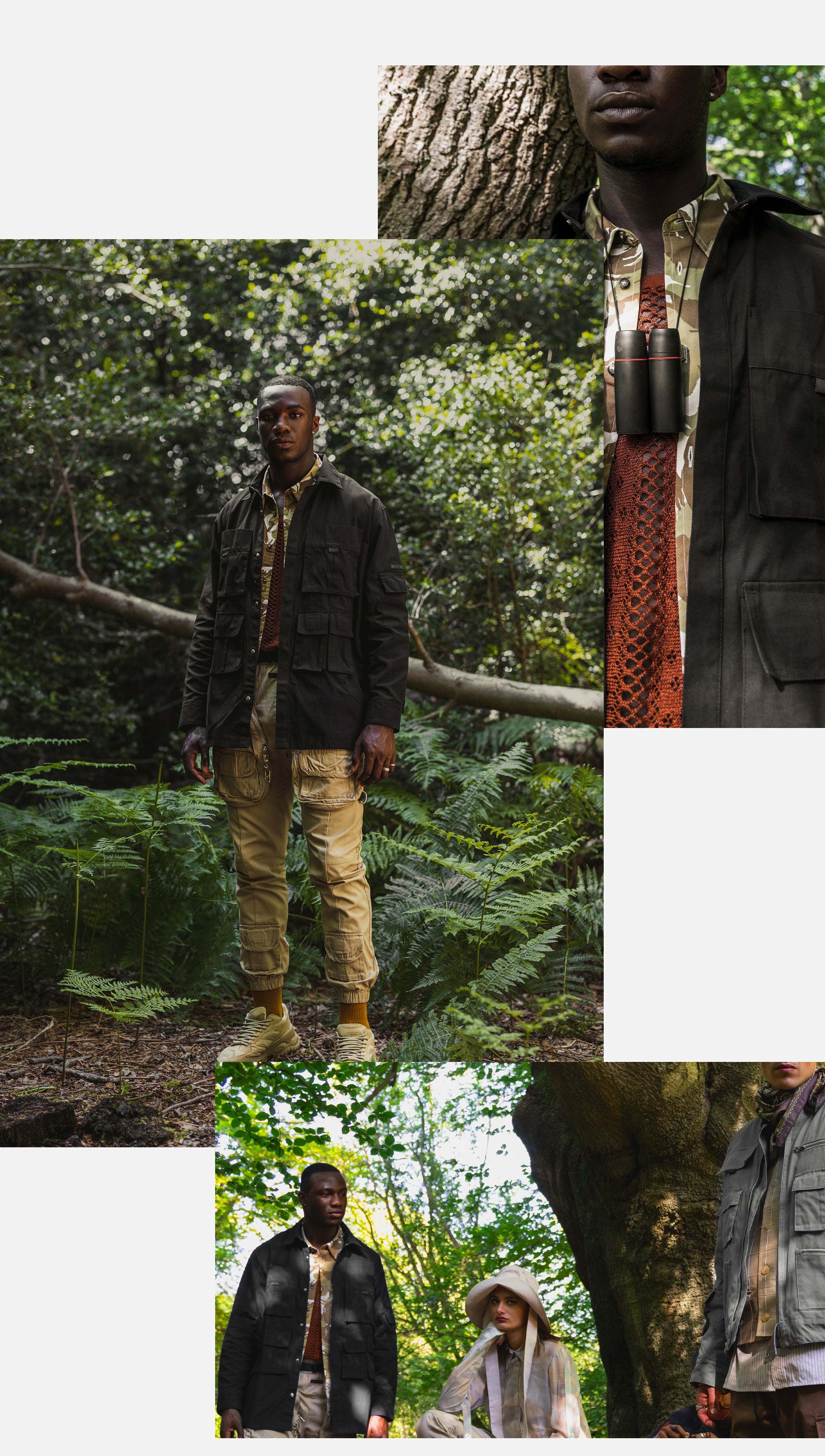 A male model is wearing a black oversized cargo shirt and sand cargo pants in a forest.