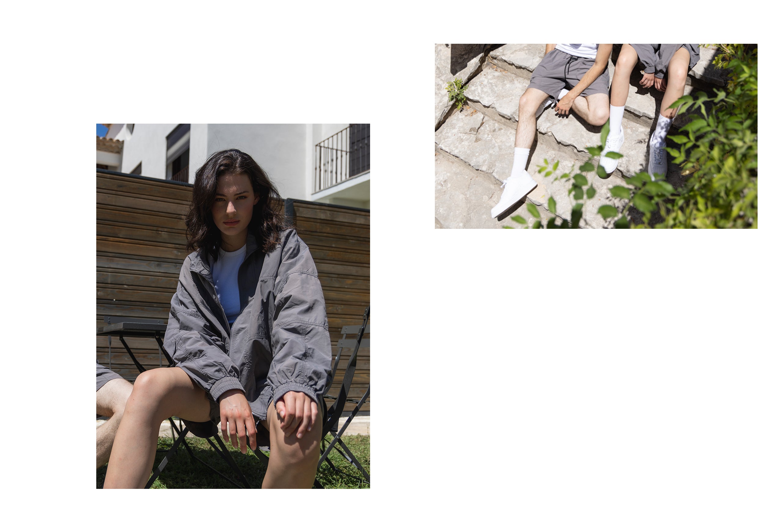 A female model wearing a gray zip-up jacket and cargo shorts is sitting on a chair.