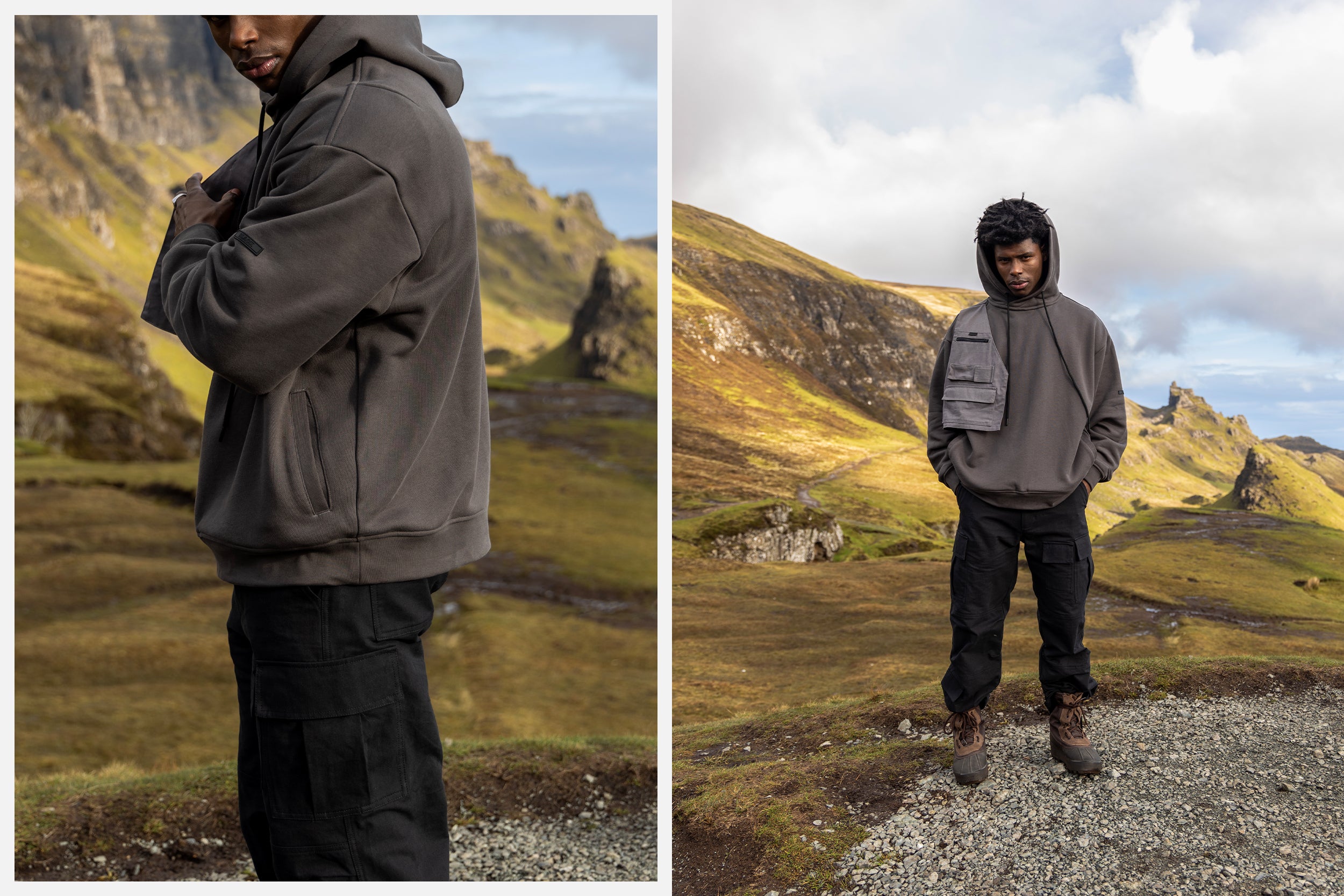 A man in grey utility pocket vest hoodie and black cargo pants stands atop the Isle of Skye.