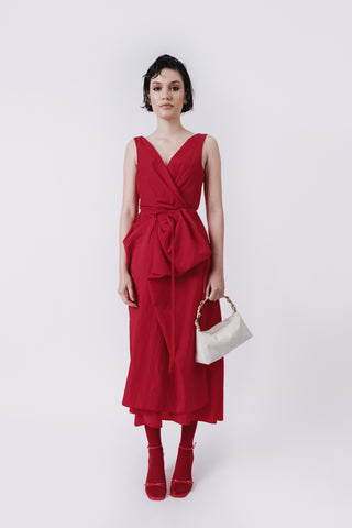 RED DRAPED DRESS AND CREAM BAG