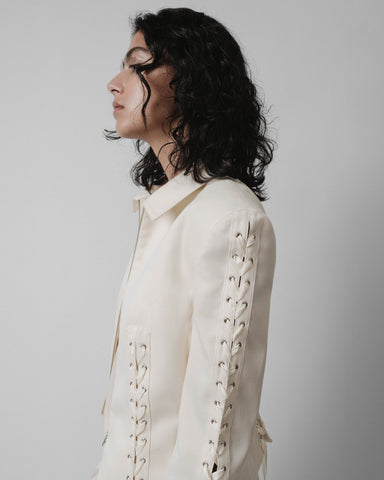 cream jacket with lace up detail