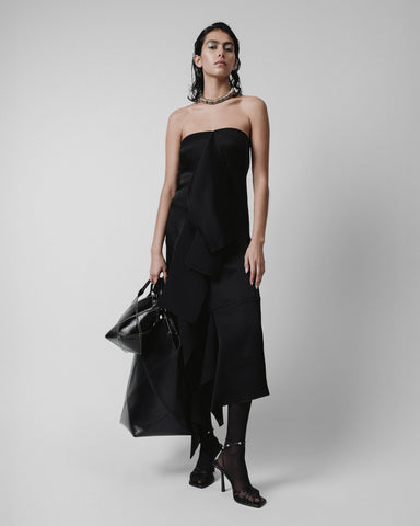 black strapless dress black handbags