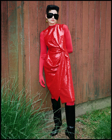 Red sequin dress featured in Iris Covet Book magazine