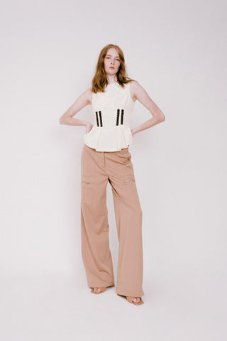 cream top with black beading, camel pants with zippers