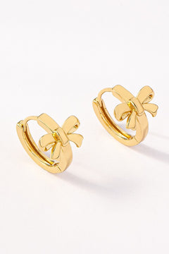 Brass bow huggie hoop earrings