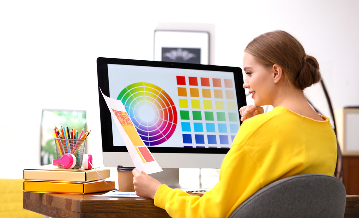 Person looking at colorful printed picture