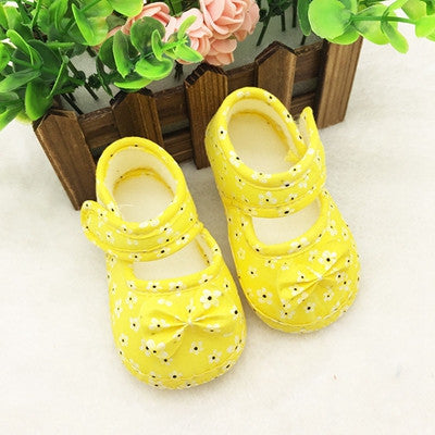 yellow infant shoes