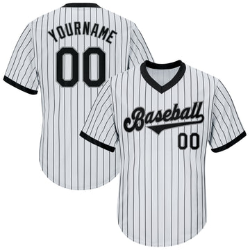 white and black baseball uniforms