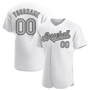white and black baseball uniforms