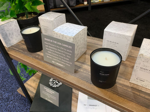 Candles hand poured by adults with disabilities in the USA, on display at the TO THE MARKET PPAI booth