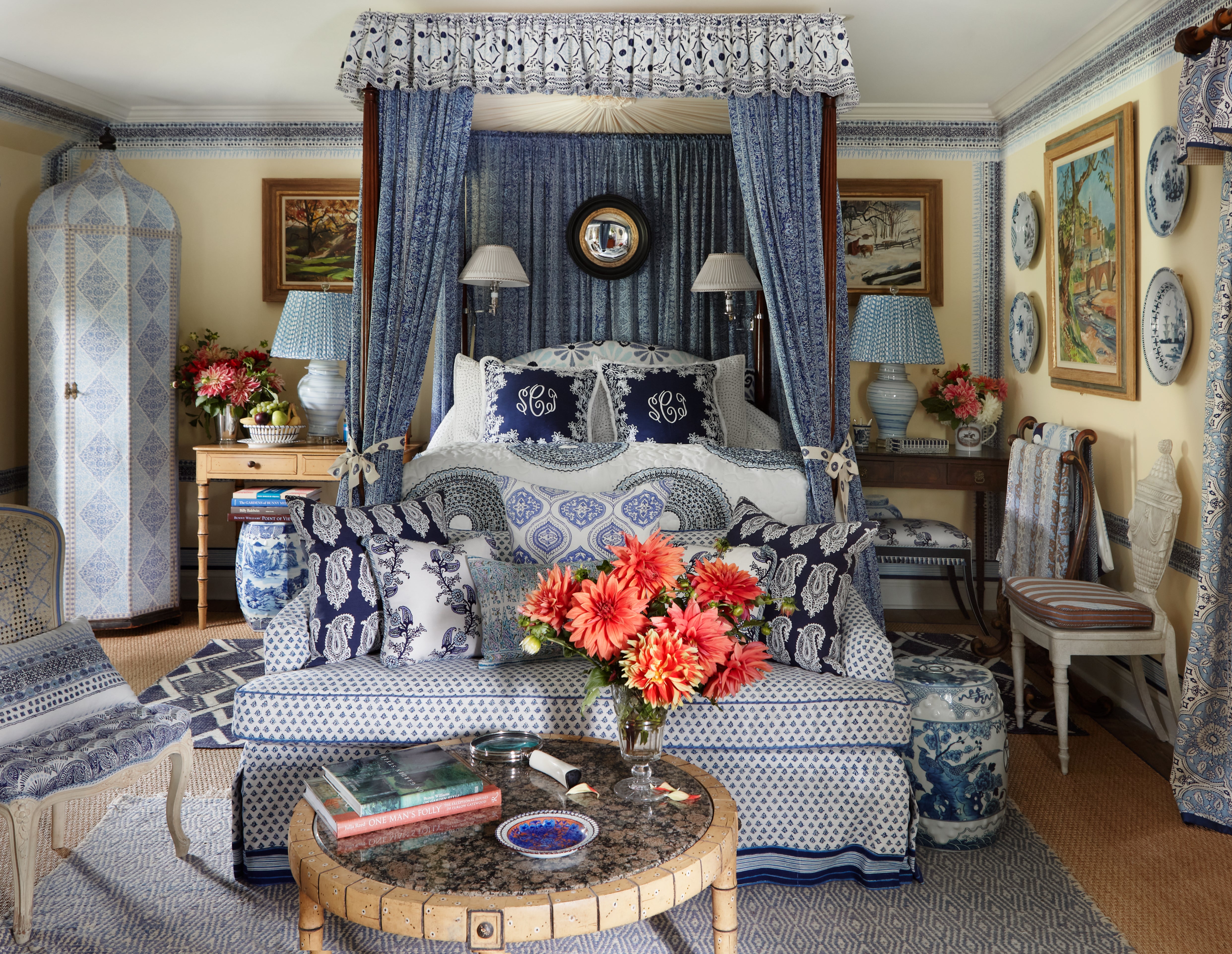 Bedroom with multiple blue pattern details designed by Stiles Colwill.