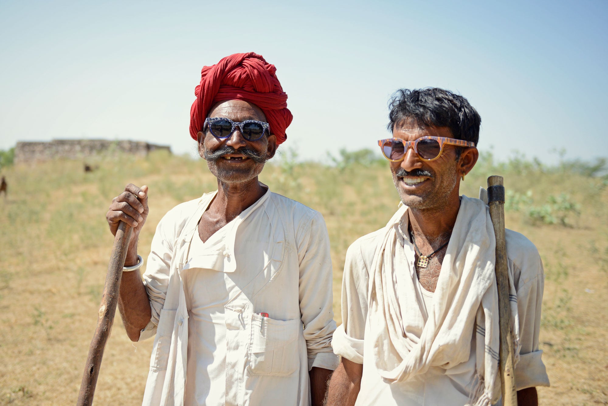 Models wear sunglasses from the John Robshaw x Mondelliani collaboration. Photo by Jonas Spinoy.